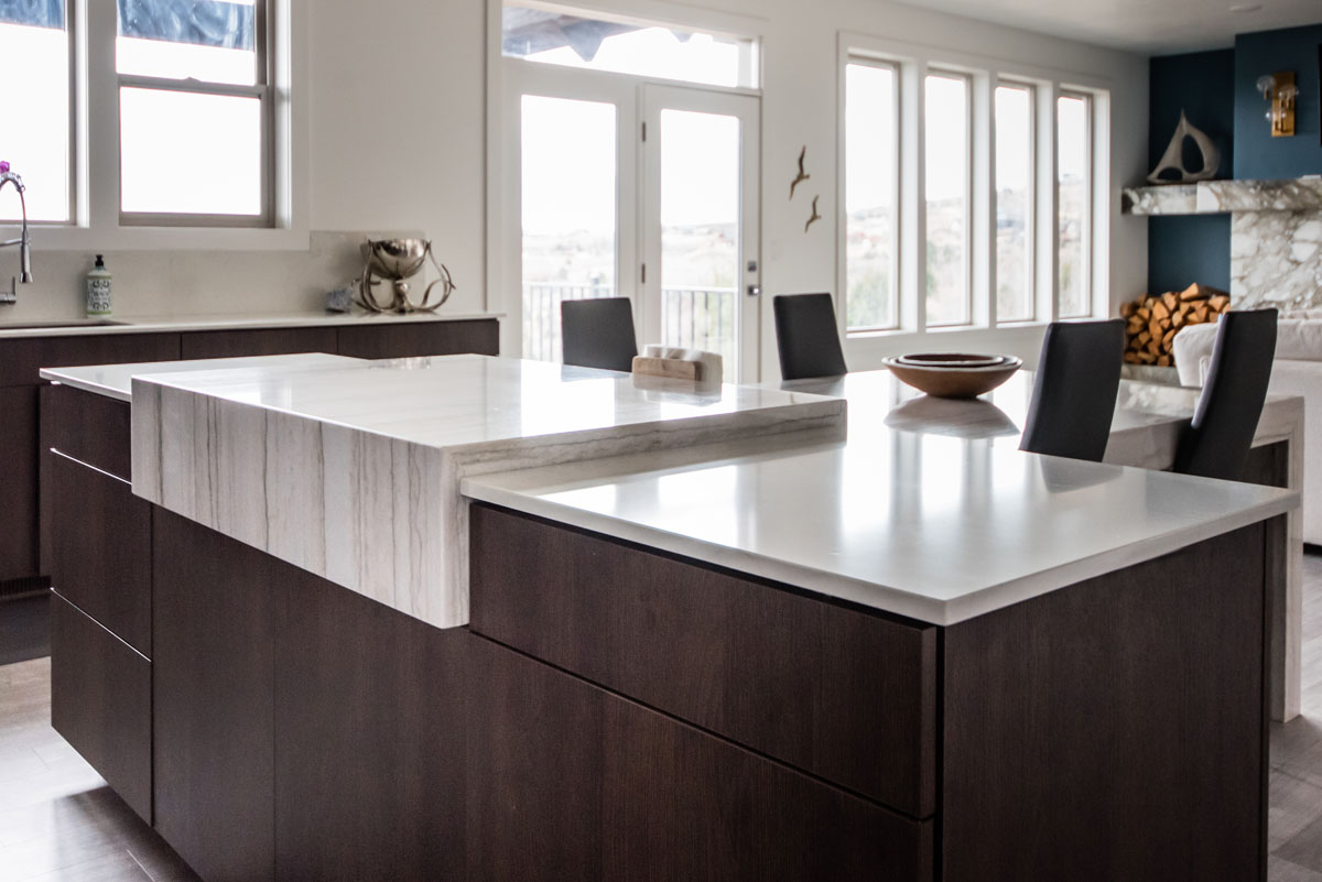 Stone countertop with decorative edge profile on display by Evolution Design